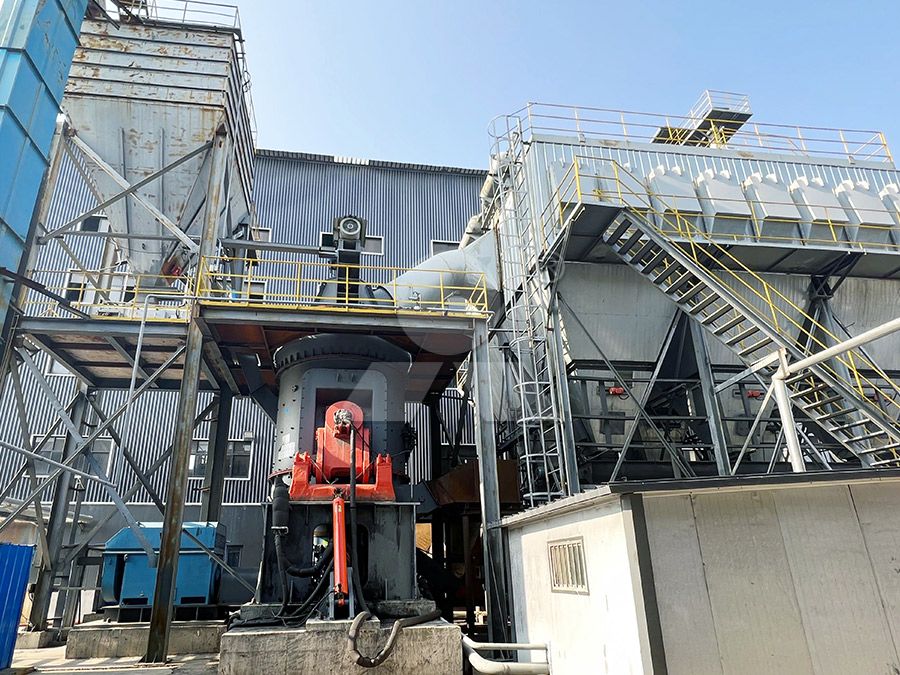 Vertical mill for refractory material processing